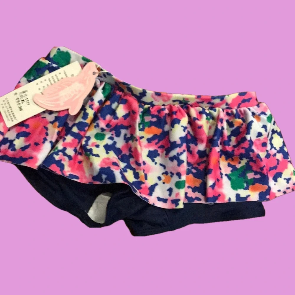 Nwt kid’s size XL (4) swim bottoms